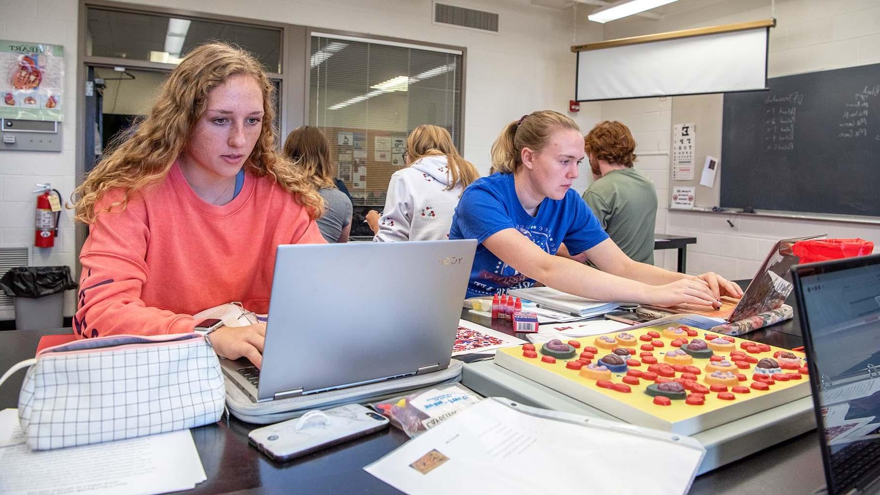 Students in anatomy lab studying blood types